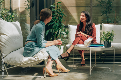 Two Elegant Women Co-Working