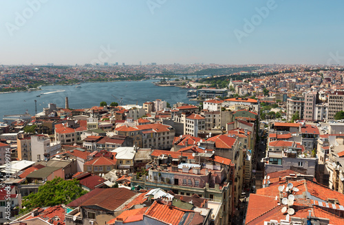 Istanbul, Turkey / May 9, 2016: City skyline view of Istanbul from Galata tower, old houses in Beyoglu district and Golden Horn landscape.