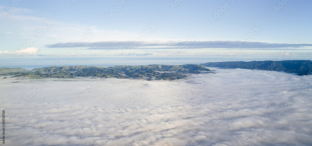 Low lying cloud and fog over Manukau Heads Low lying cloud and fog over Manukau Heads