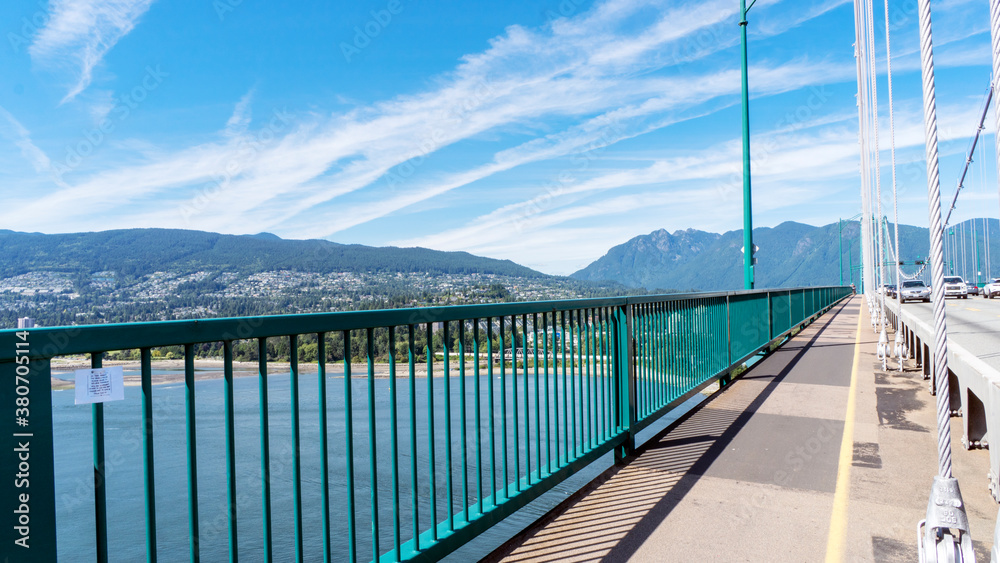 North Shore mountains and West Vancouver hillside residences viewed from Lions Gate bridge, BC