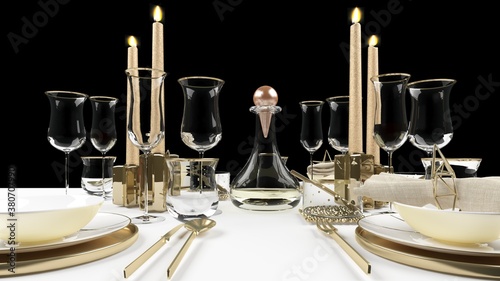 Elegant dinning table with wine glasses, plates and candles set for christmas dinner.