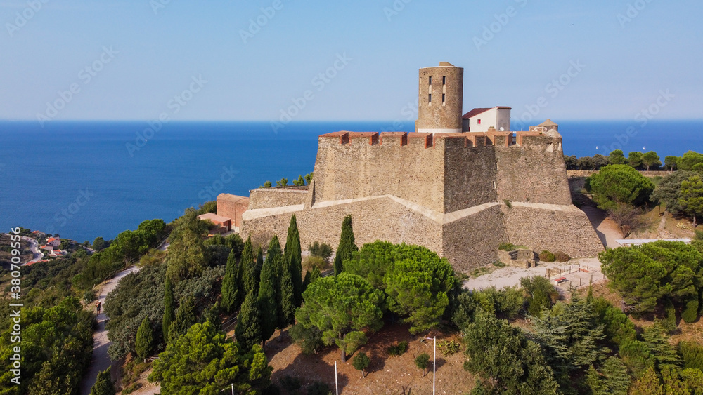 Aerial view of the Fort Saint Elme above the town of Collioure in the south of France - Star shaped medieval fortress built on a hilltop over the Mediterannean Sea in the Catalan country