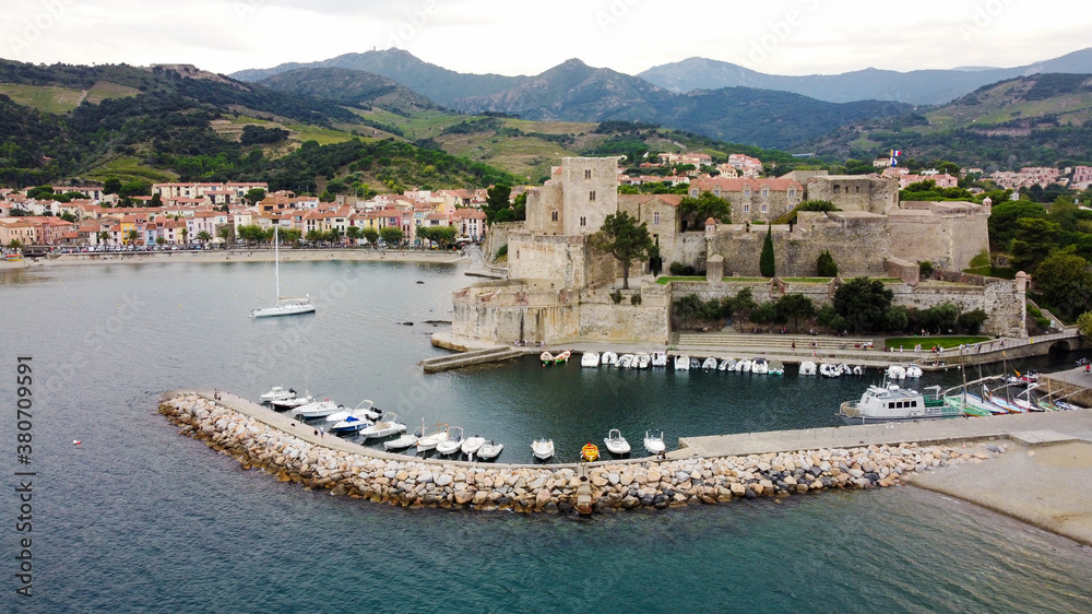 Aerial view of the Royal Castle of Collioure in the South of France in the bay of La Baleta along the coast of the Mediterranean Sea in the Eastern Pyrenees