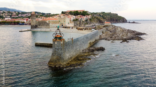 Aerial view of the lighthouse of Collioure in the South of France - Entrance to the bay of La Baleta in the Mediterranean Sea, Eastern Pyrenees photo