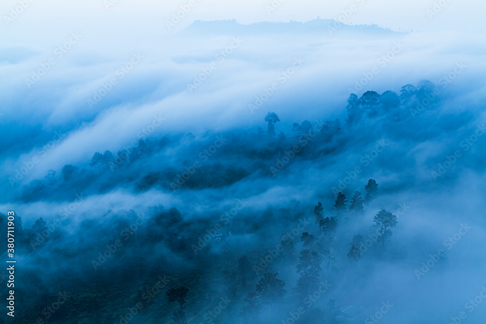 Fog waves in Ella gap between Ella rock & Little adam's peak in Sri Lanka