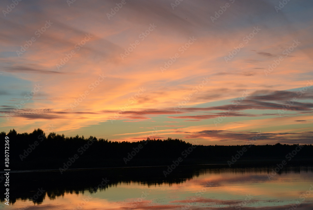 Evening landscape sunset on the lake with reflection in the water Evening landscape sunset on the lake with reflection in the water