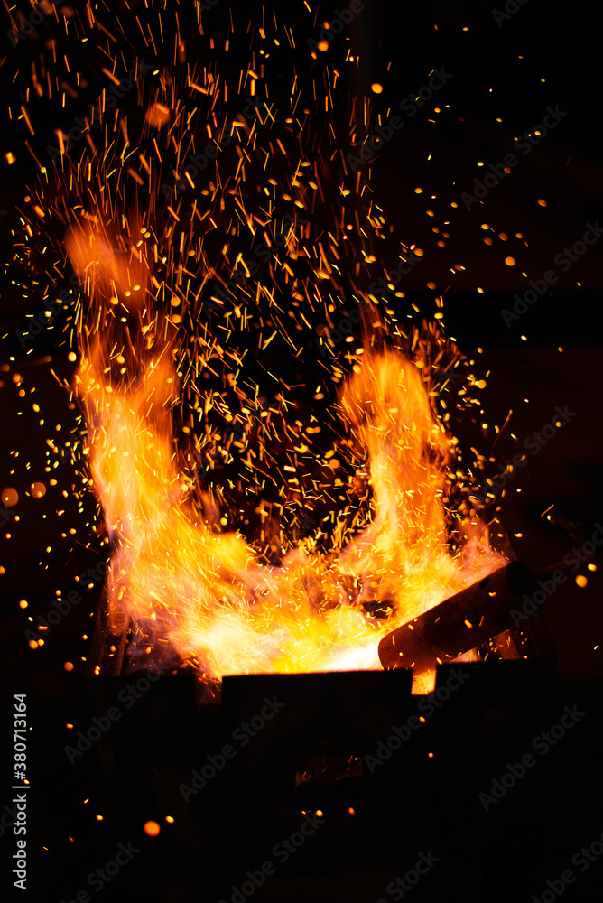 Getting the fire started using gas torch Stock Photo | Adobe Stock