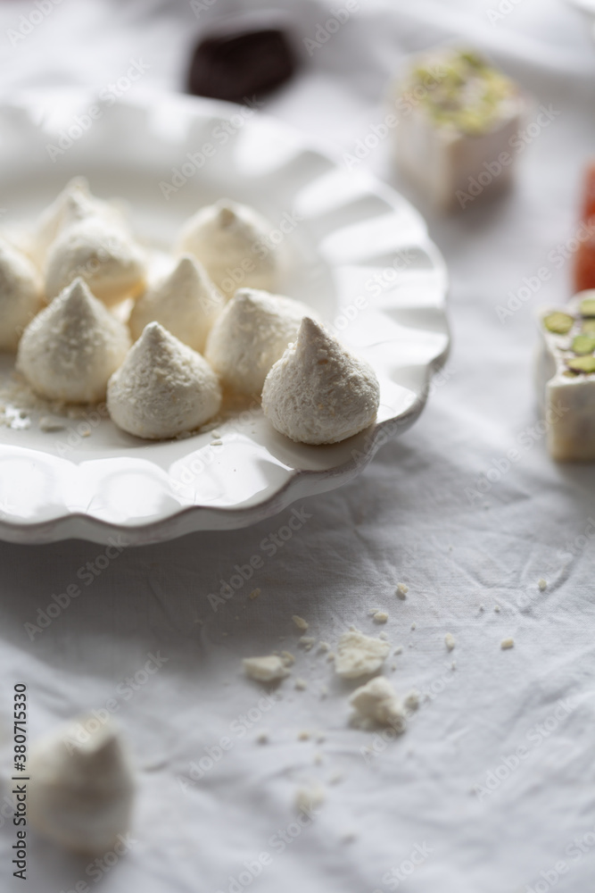 Torrone with pistachio, coconut meringue and grapefruit jelly cube Torrone with pistachio, coconut meringue and grapefruit jelly cube