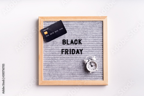 Text black friday on gray letter board on white background