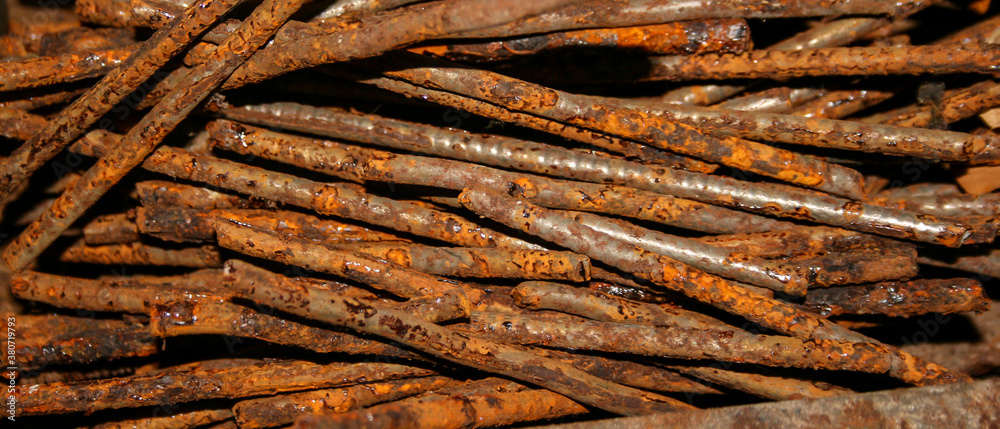 Industrial pattern of rusty long nails Industrial pattern of rusty long nails
