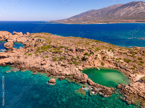 Crete Coast Line from Top during summer time with a round lagoon and crystal water