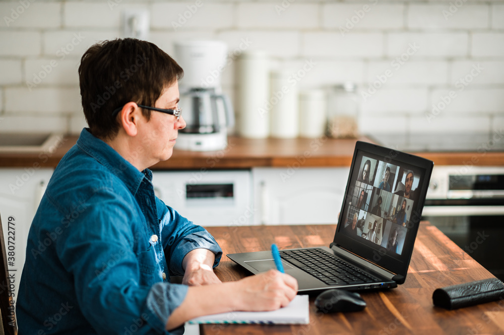 Woman working remotely from home Woman working remotely from home