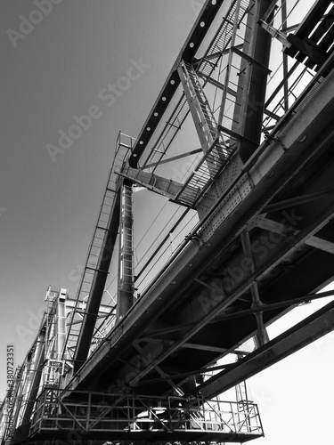 Metal railway bridge, steel construction, black and white 
