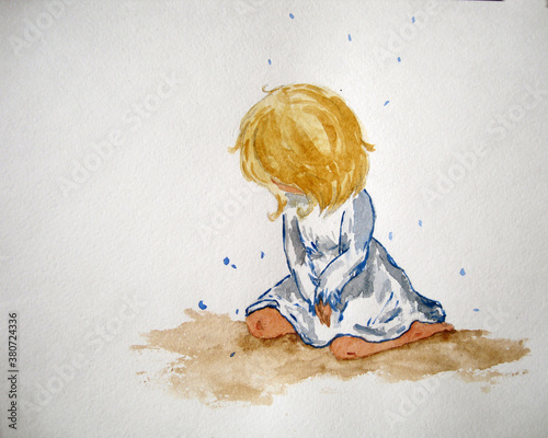 upset girl bowed her head and is sitting on the ground