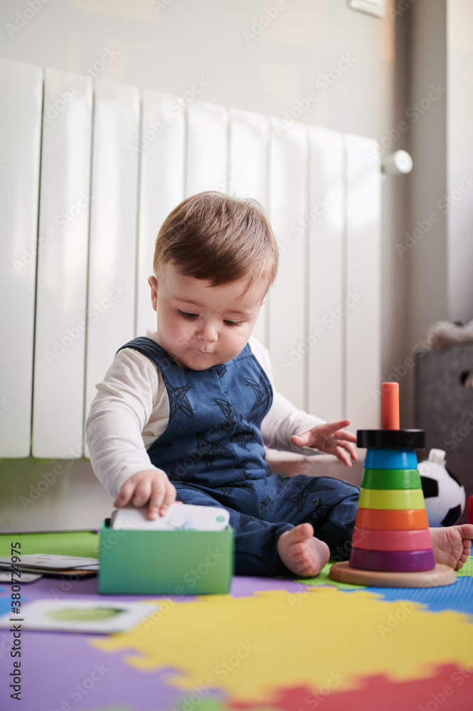 Baby in playroom Baby in playroom