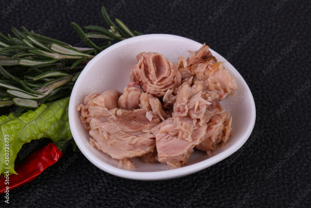 Tasty canned tuna fish in the bowl