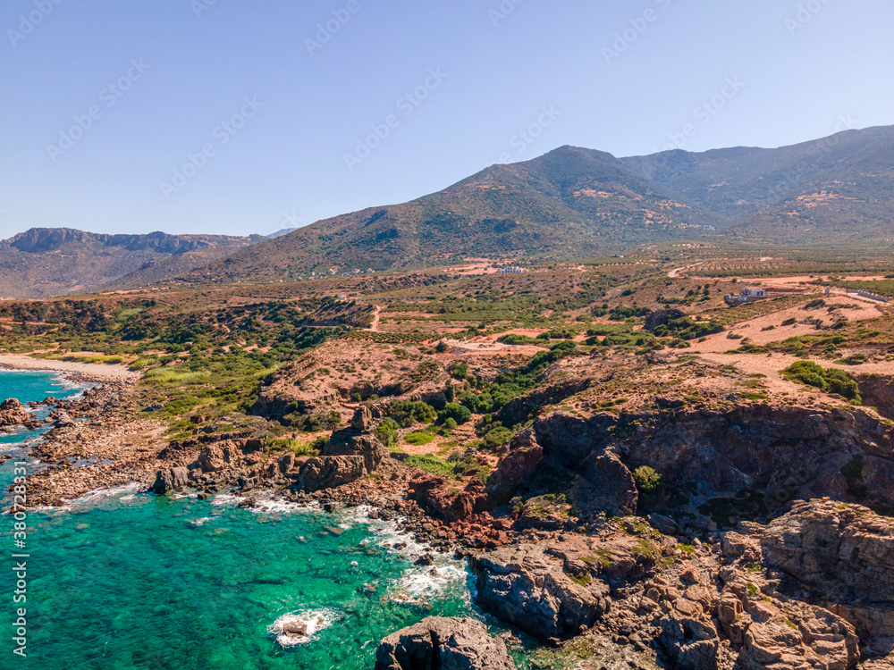 Crete coast view with rocks and pure nature during a sunny summer day Crete coast view with rocks and pure nature during a sunny summer day