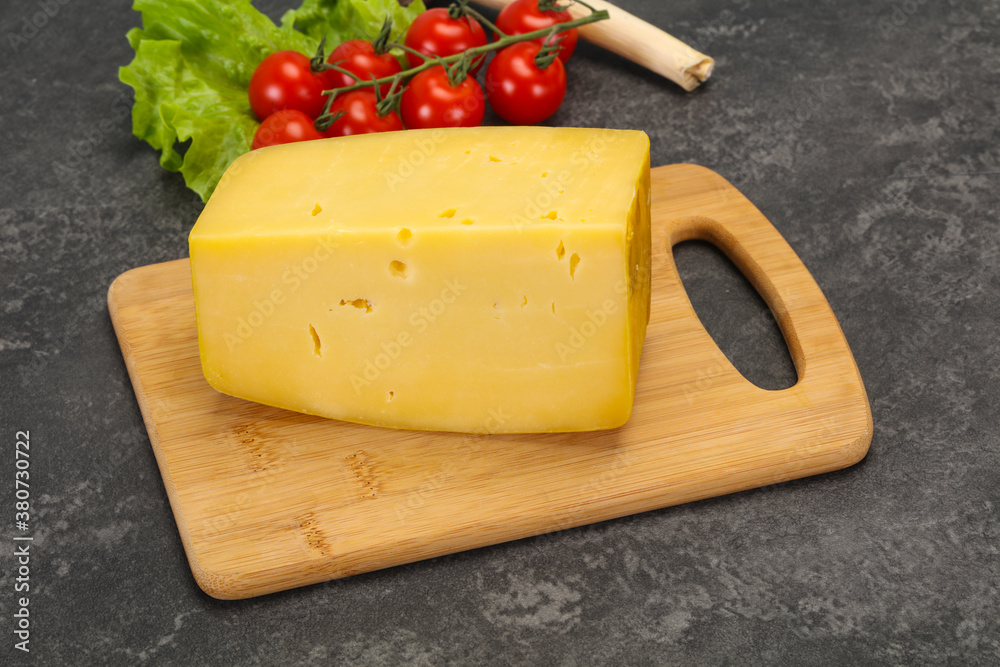 Hard yellow tasty cheese brick Hard yellow tasty cheese brick