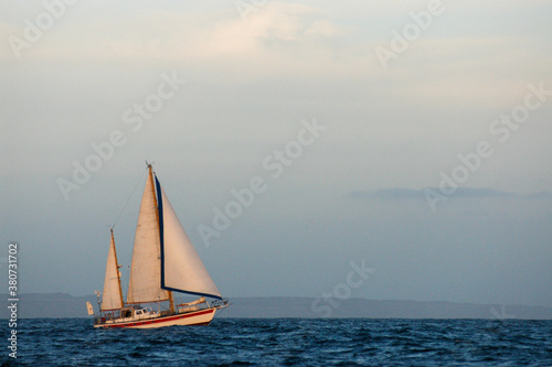 double masted sailboat is sailing in headwind