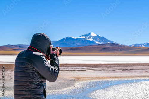Wallpaper Mural Man Taking Photos, Brava Lagoon, La Rioja, Argentina Torontodigital.ca