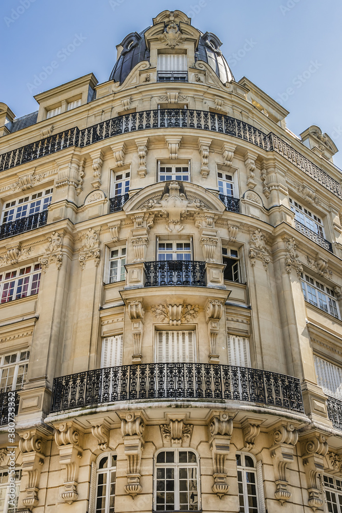 The beautiful architecture of old apartment buildings on the Montmartre hill. Paris. France. The beautiful architecture of old apartment buildings on the Montmartre hill. Paris. France.