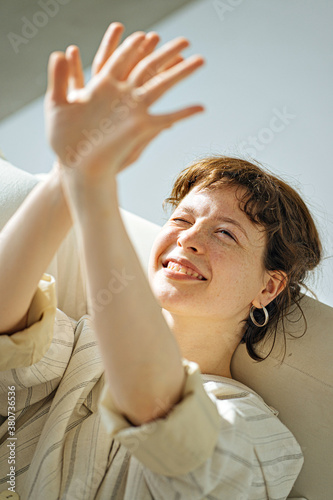 portrait of a girl in a sunlit room