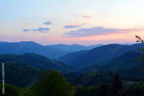 Colorful blue sunset on top of Ukrainian mountains. Carpathians, Synevir. Nature background