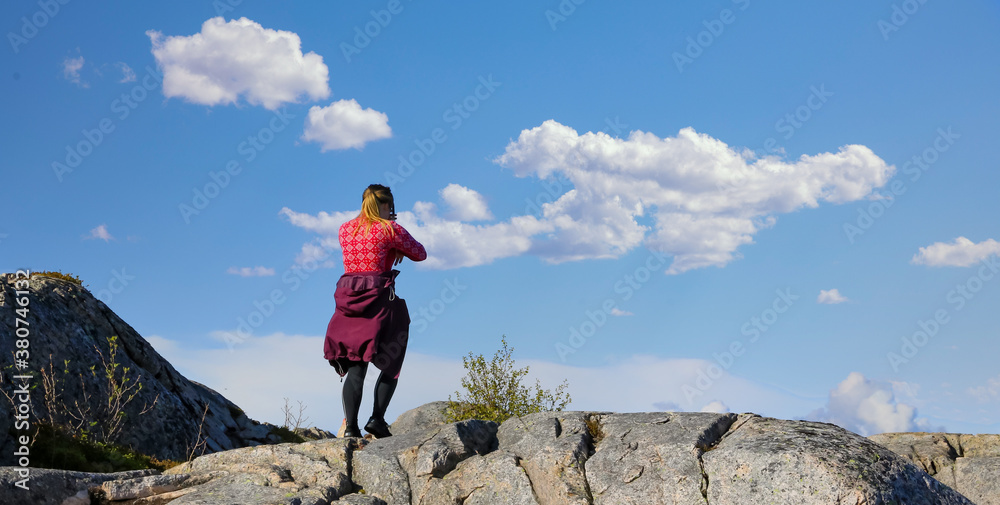 Happy girl  on top of mountain