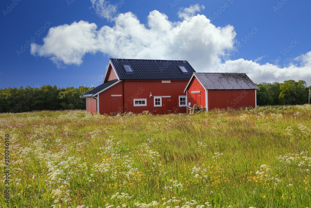 Old red barn and sky in Nordlandcounty Old red barn and sky in Nordlandcounty