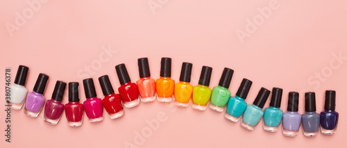 concept, manicure with nail polish, pedicure on pink background, copy space, Flat Lay