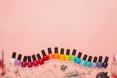 concept, manicure with nail polish, pedicure on pink background, copy space, Flat Lay