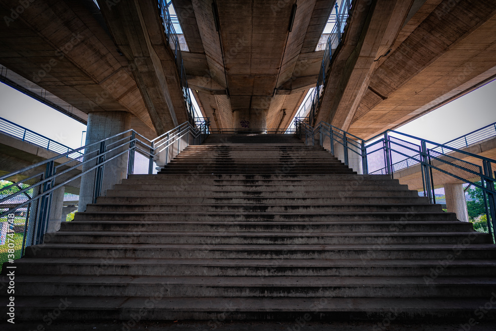 Fototapeta premium Walkway under the bridge over Ada in Serbia's capital
