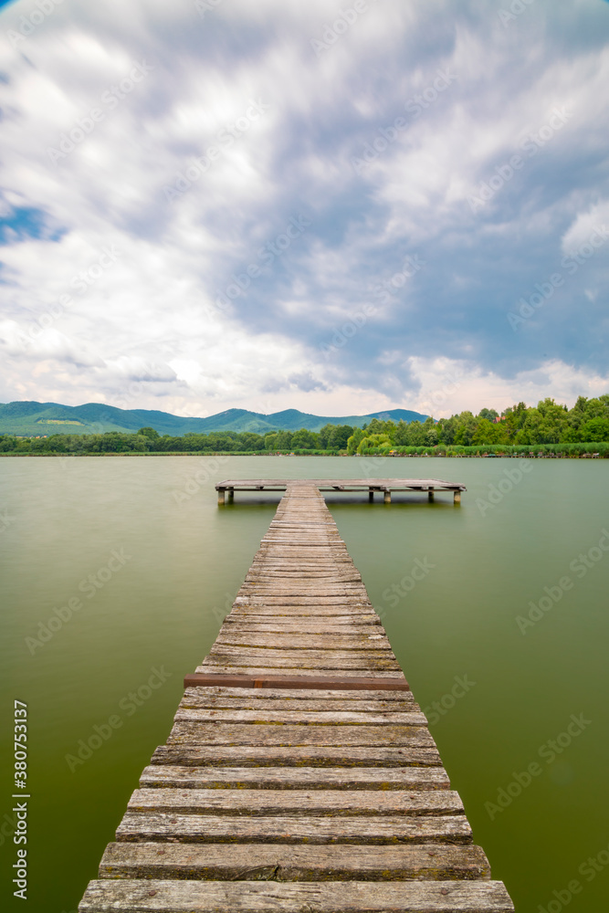 Fototapeta premium Pier on the pond Jenoi-to, Hungary