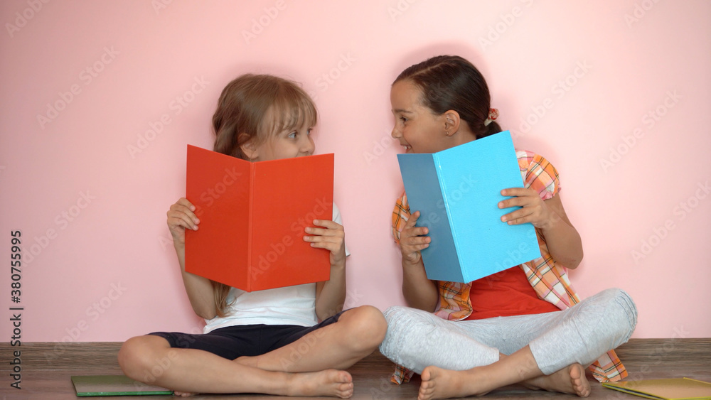 happy little girls with classmates having fun at the School happy little girls with classmates having fun at the School