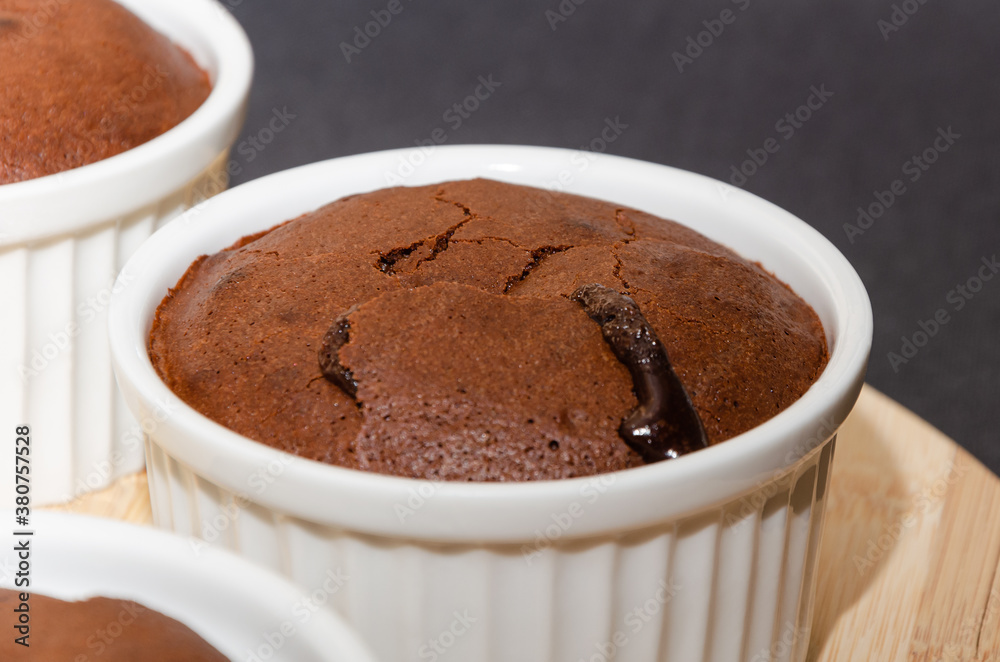 Chocolate lava cake with molten center baked in a ramekin. Lava cake Chocolate lava cake with molten center baked in a ramekin. Lava cake