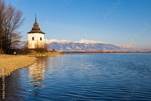 Church of Virgin Mary in Havranok and lake Liptovska Mara, district Liptovsky...