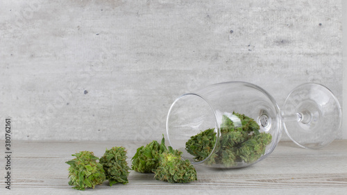 Fresh cannabis flowers in a wine glass