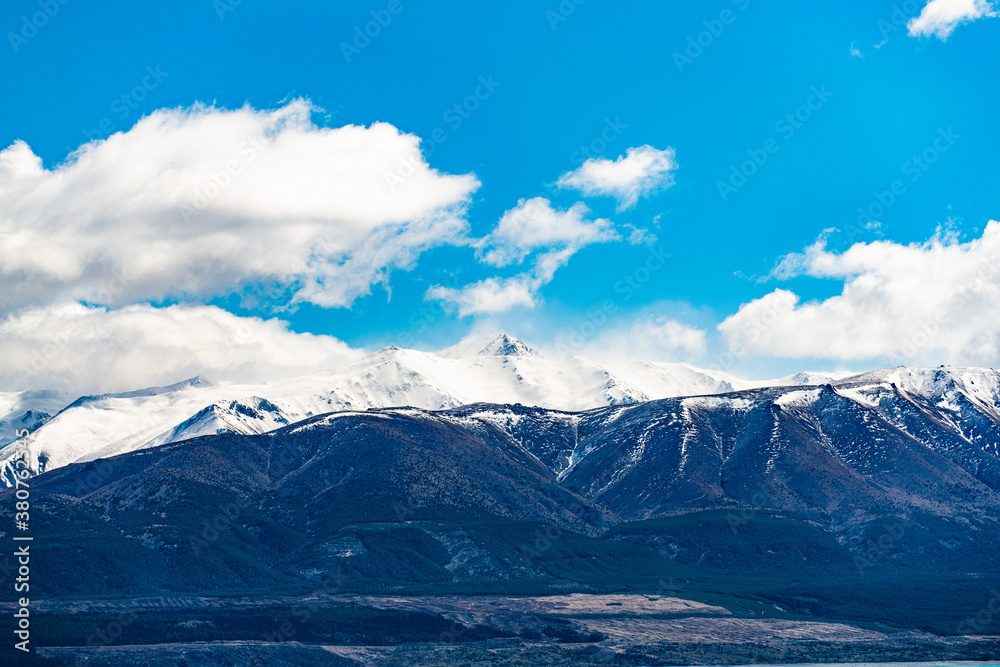 landscape with lake and blue sky and clouds landscape with lake and blue sky and clouds