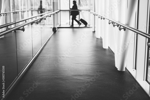 People travelling with Luggage into Airport photo