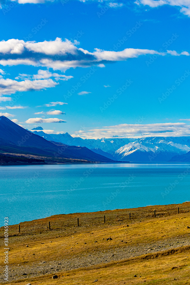 blue sky with a lake and mountains