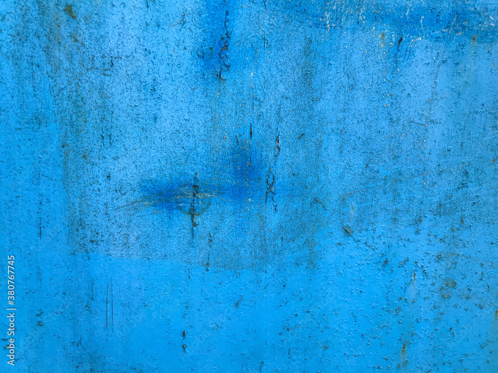 texture, blue color. rust, damage on the metal sheet. house covering, benches. blue painted metal surface. scuffs of a metal sheet, cuts. stylish surface design