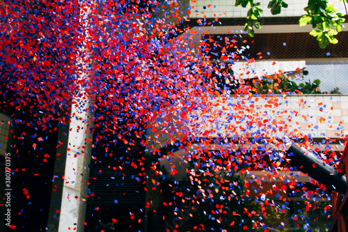 Cannon shooting colourful confetti in Rio de Janeiro carnival parade celebration - Brazil photo