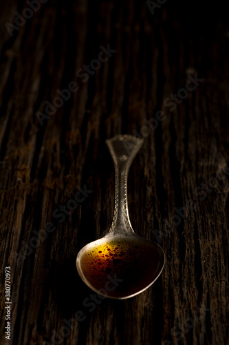 Infused Olive Oil in Spoon photo