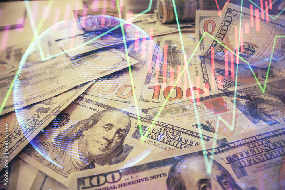 Multi exposure of forex chart drawing over us dollars bill background. Concept of financial success markets. Multi exposure of forex chart drawing over us dollars bill background. Concept of financial success markets.