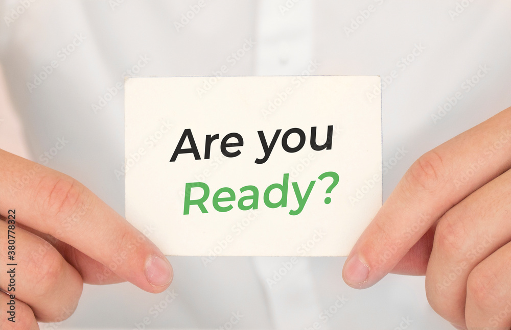 Man's hands take a card with words You will make it, finance and business concept. Man's hands take a card with words You will make it, finance and business concept.