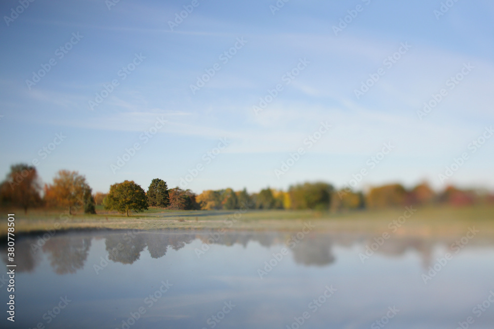 Fog In The Morning Over An Autumn Lake In Michigan Fog In The Morning Over An Autumn Lake In Michigan