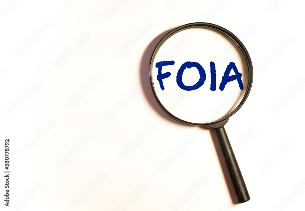 Paper with The Freedom of Information Act FOIA on a table Paper with The Freedom of Information Act FOIA on a table