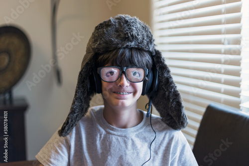 Silly young boy wearing crazy eyeglasses