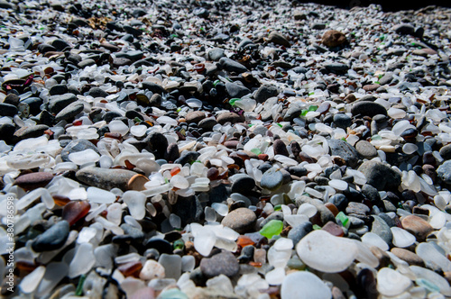 Full frame image of sea glass on a beach photo