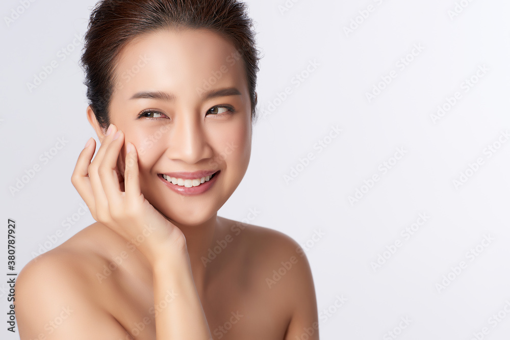 Beautiful young asian woman with clean fresh skin on white background, Face care, Facial treatment, Cosmetology, beauty and spa, Asian women portrait Beautiful young asian woman with clean fresh skin on white background, Face care, Facial treatment, Cosmetology, beauty and spa, Asian women portrait